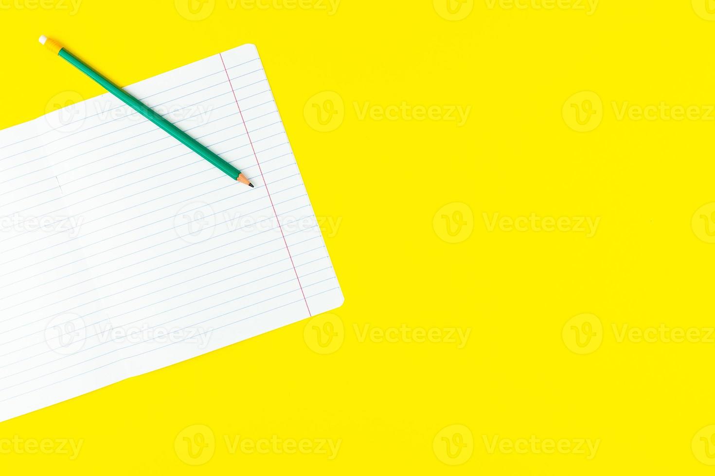 Pencil on a notebook photo