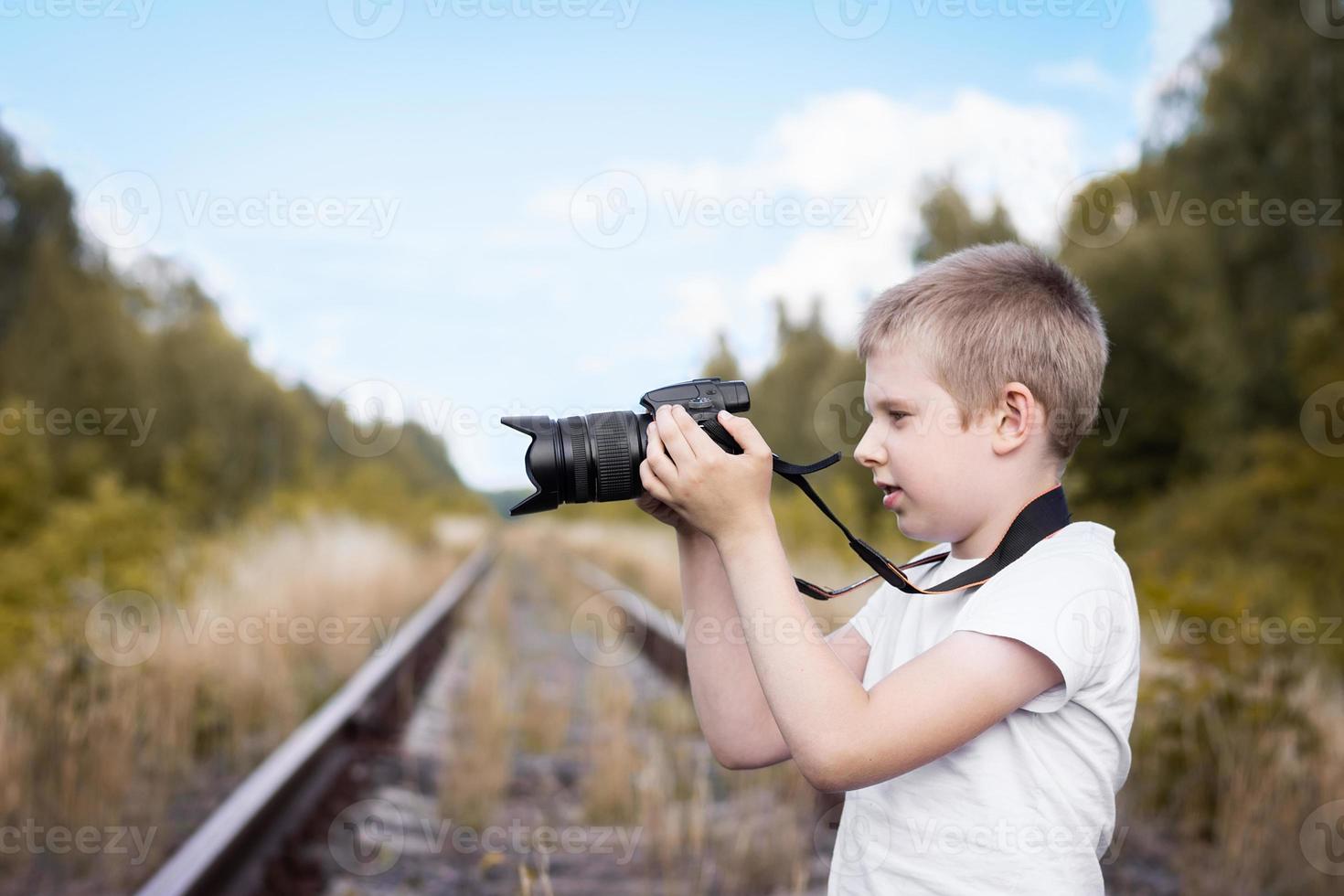 the boy with the camera photo