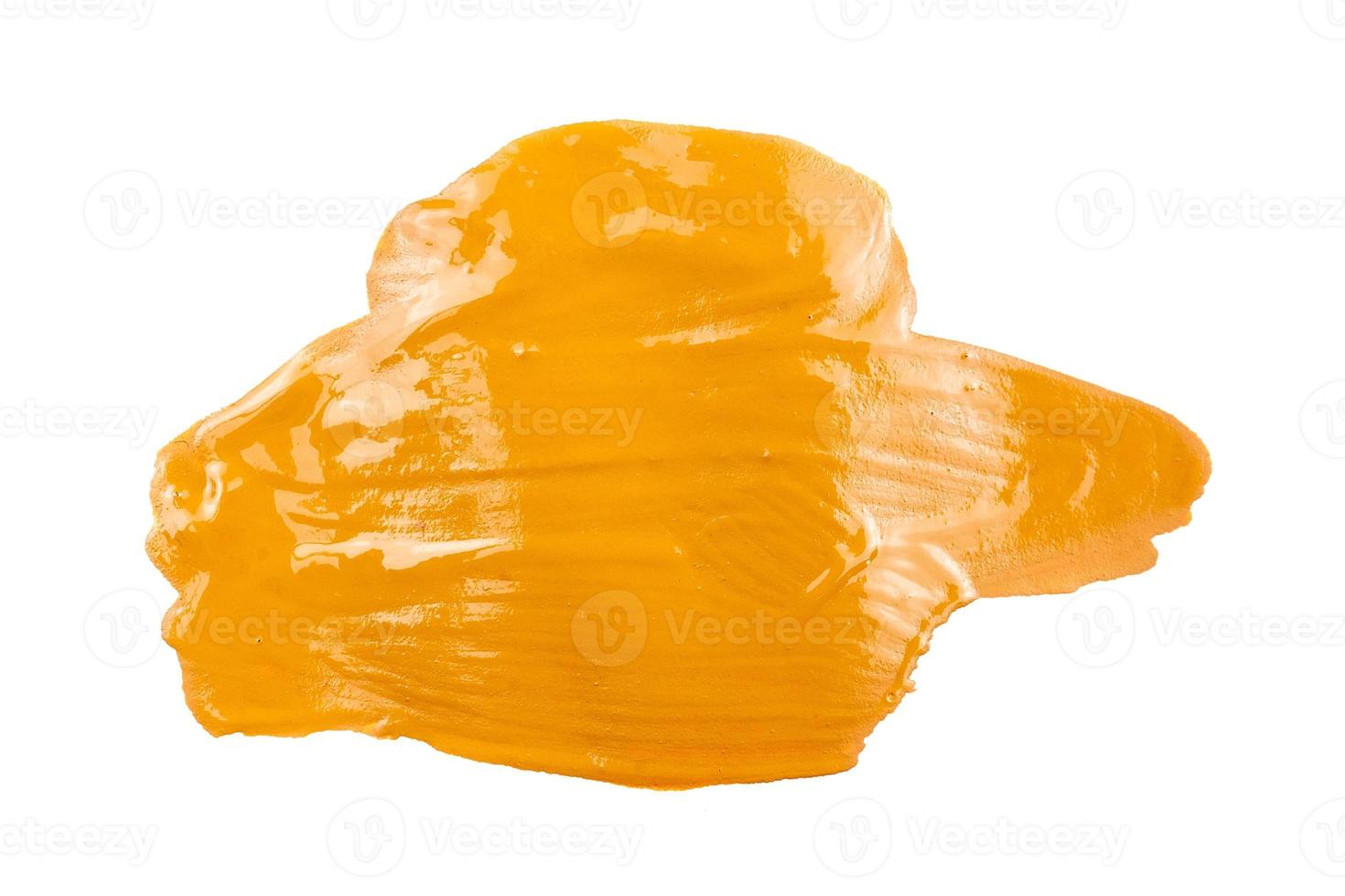 Yellow paint on white background photo