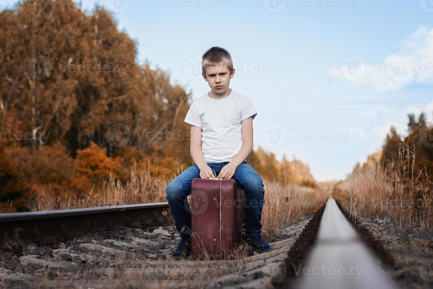 boy suitcase railway photo