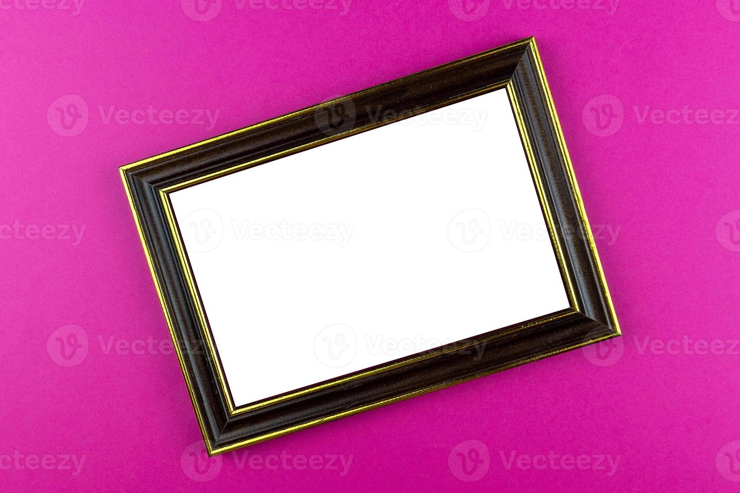 Wooden frame pink background photo