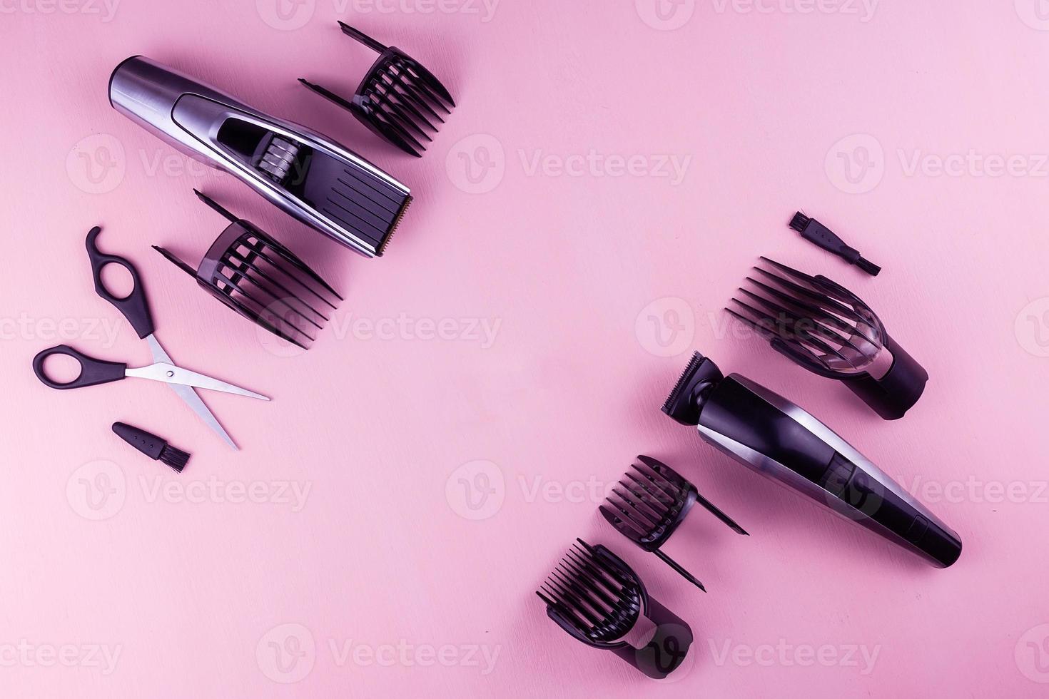 hair clipper pink background. photo