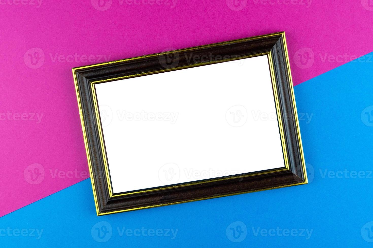 Wooden frame blue background photo