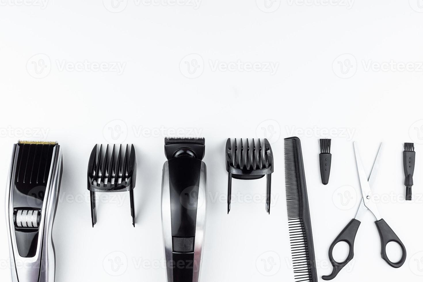 scissors and combs on white photo