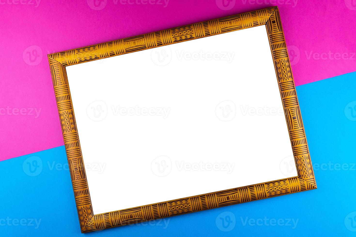 Wooden frame blue background photo