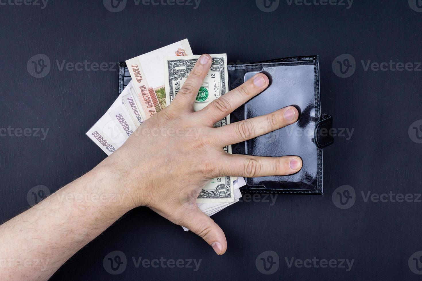 wallet with money in hand photo