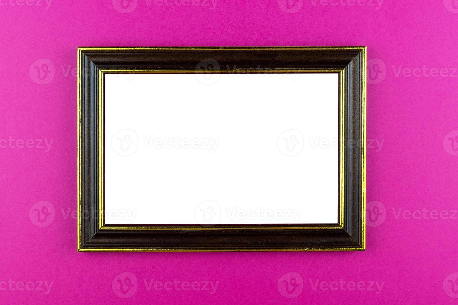 Wooden frame pink background photo