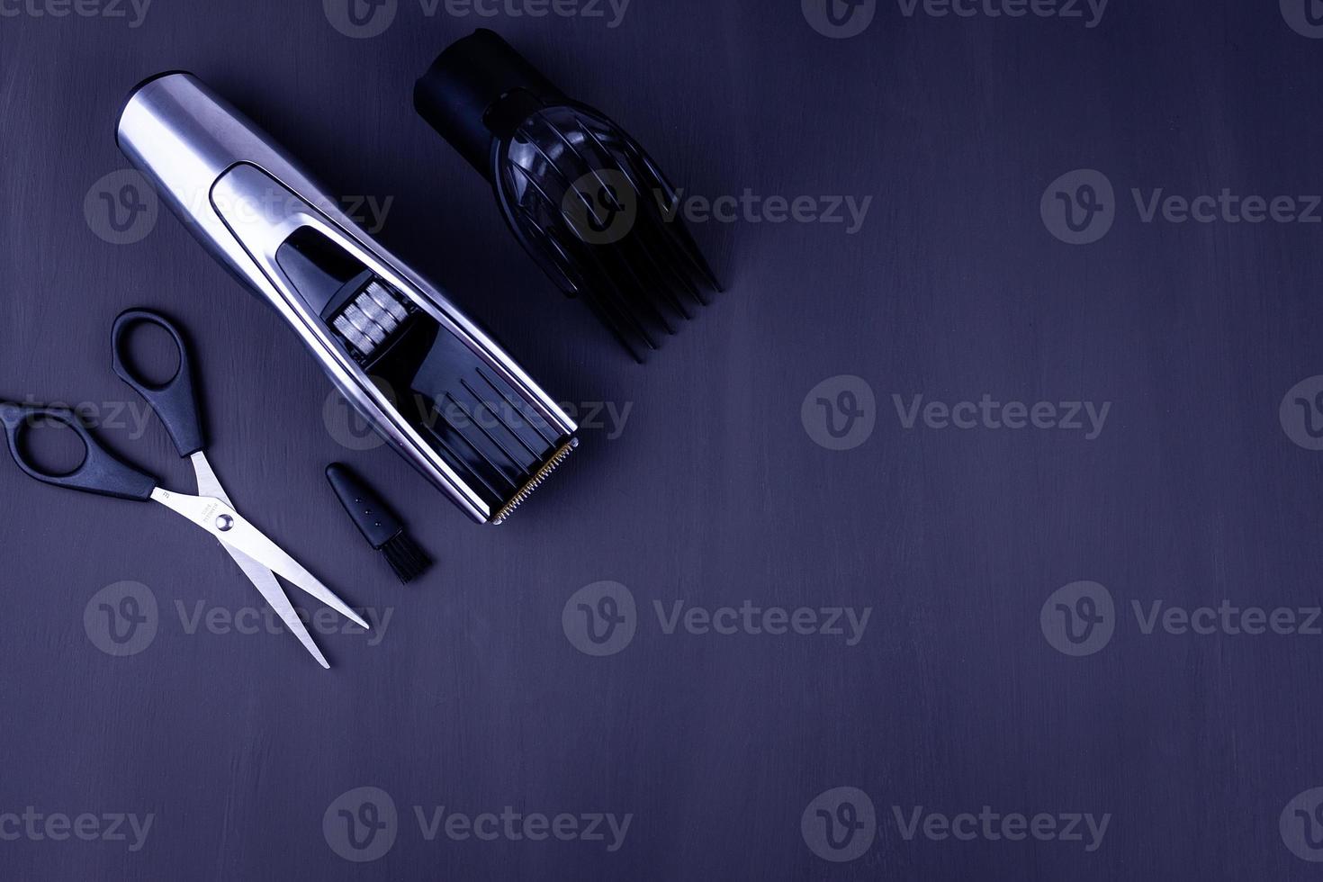 hair clipper black background photo