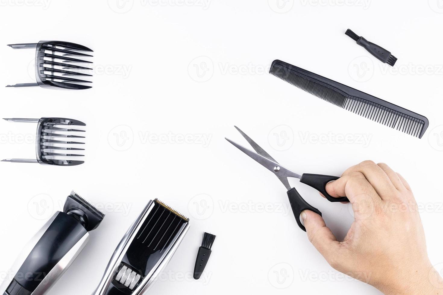 scissors and combs on white photo