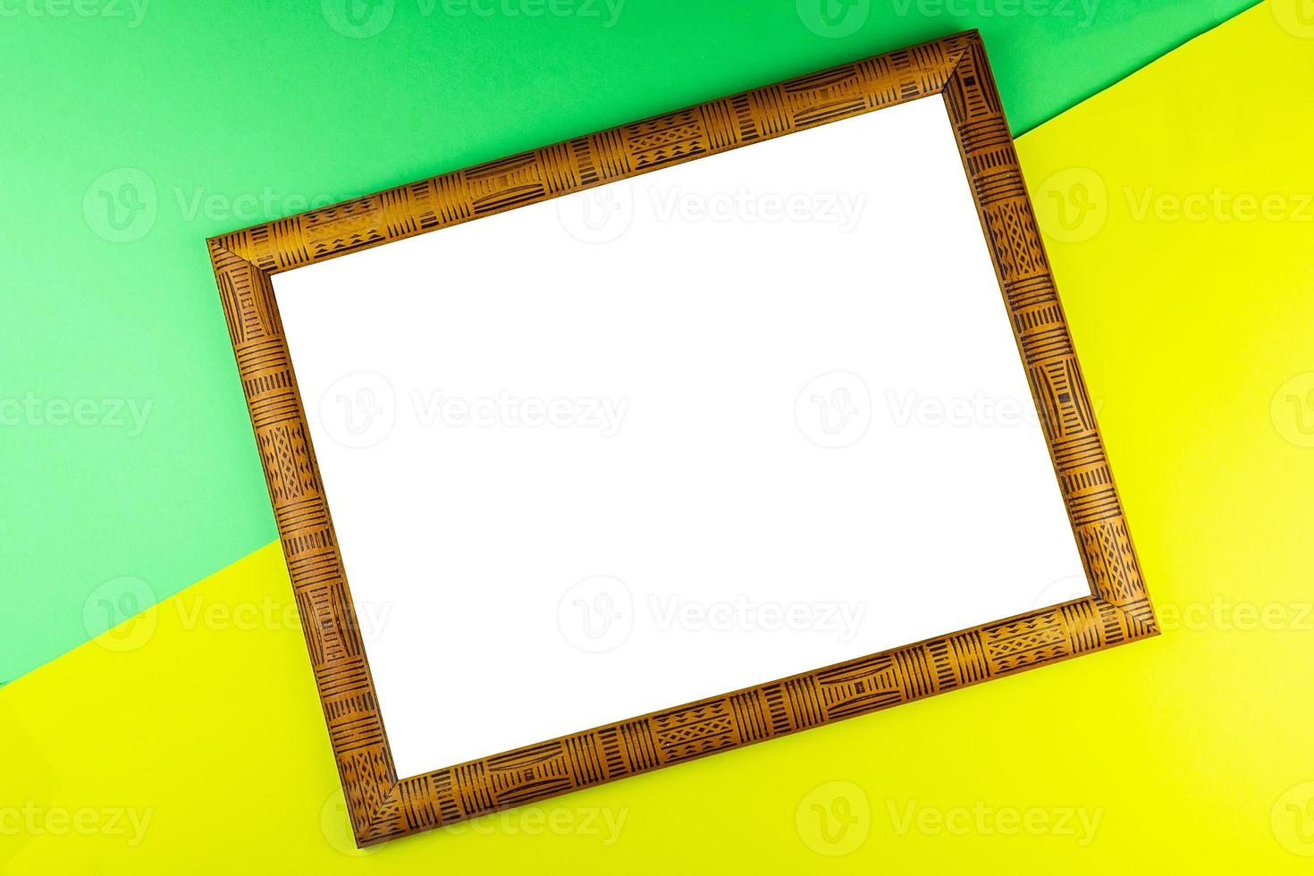 Wooden frame yellow background photo