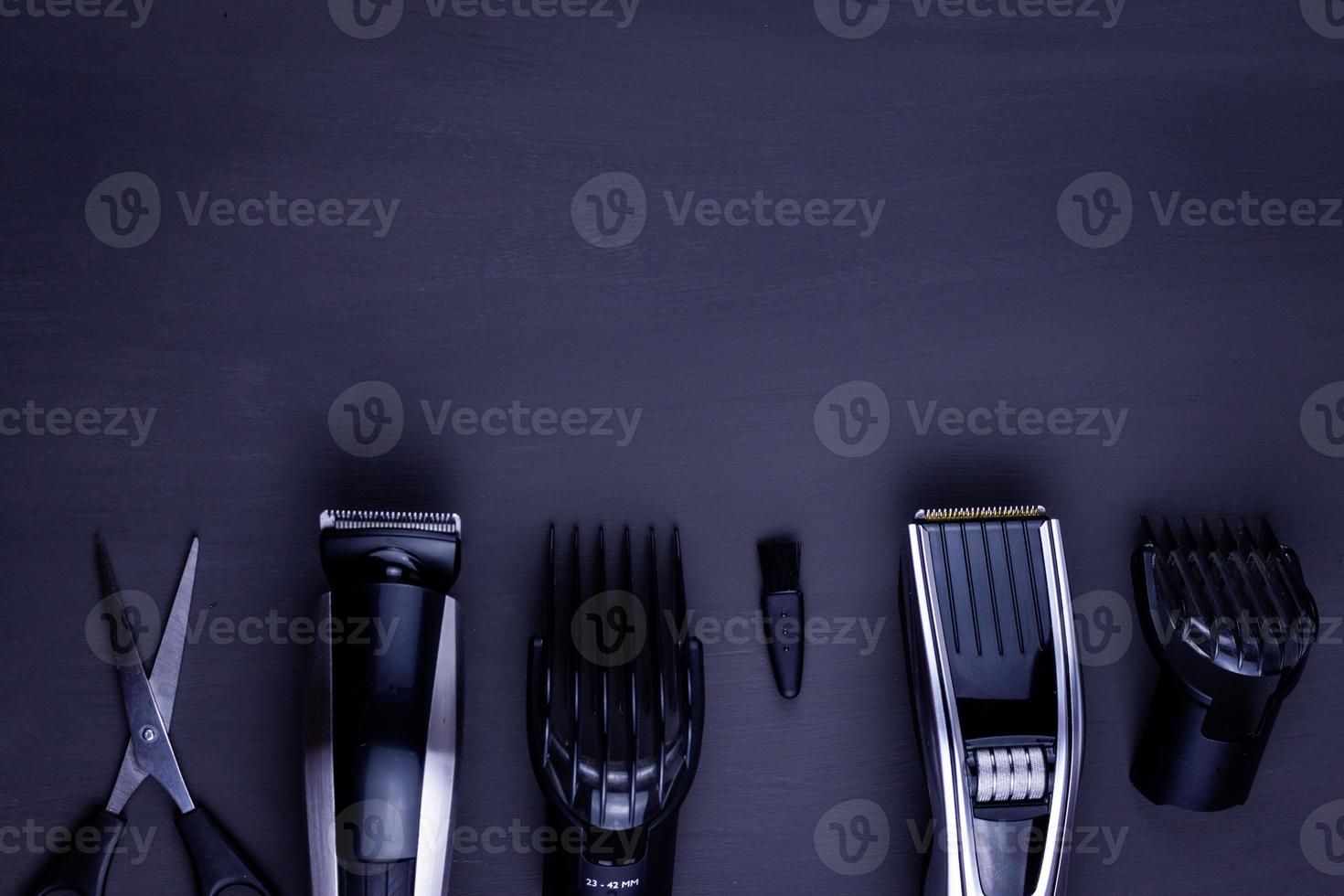 hair clipper black background photo