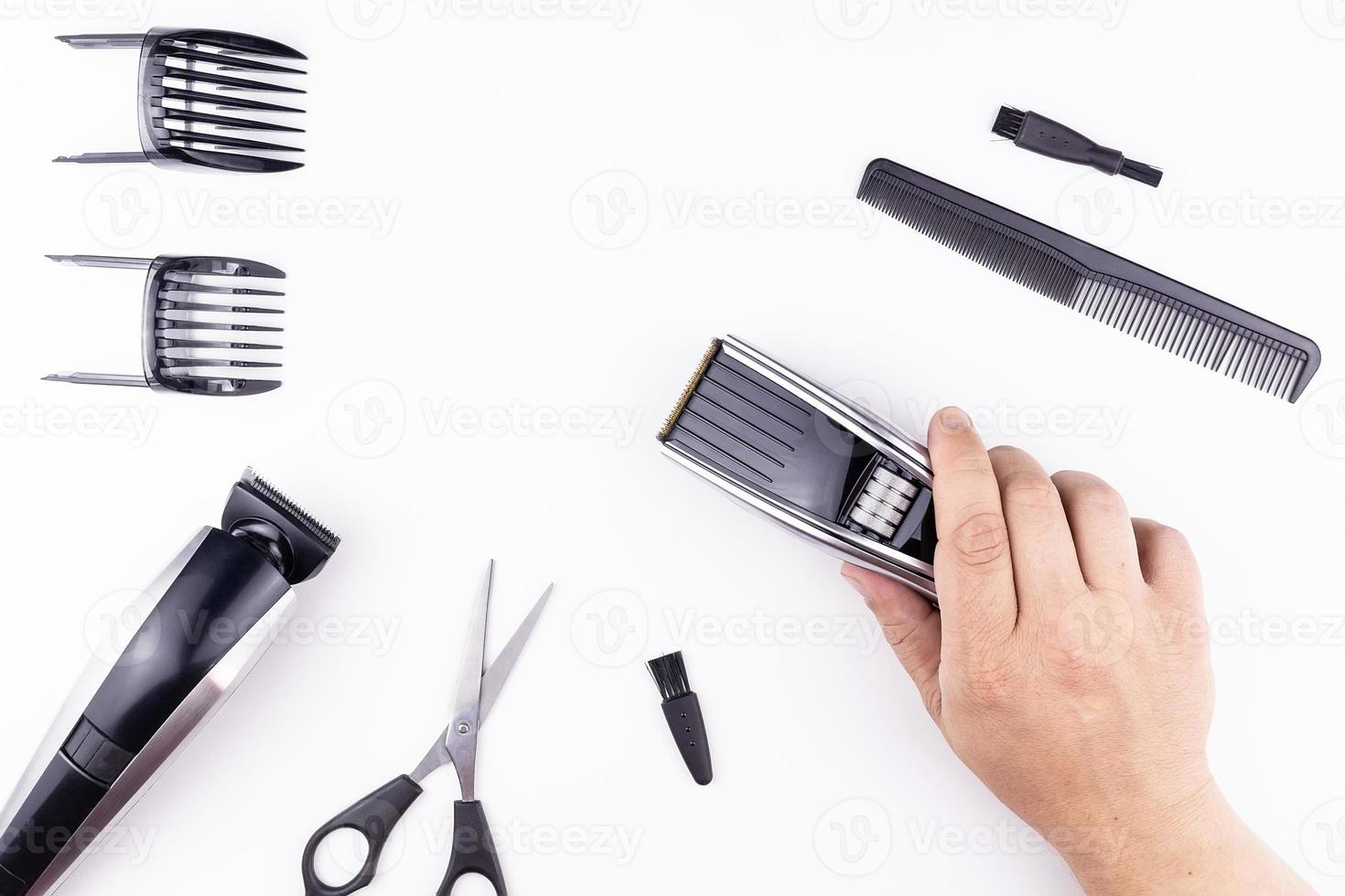 scissors and combs on white photo