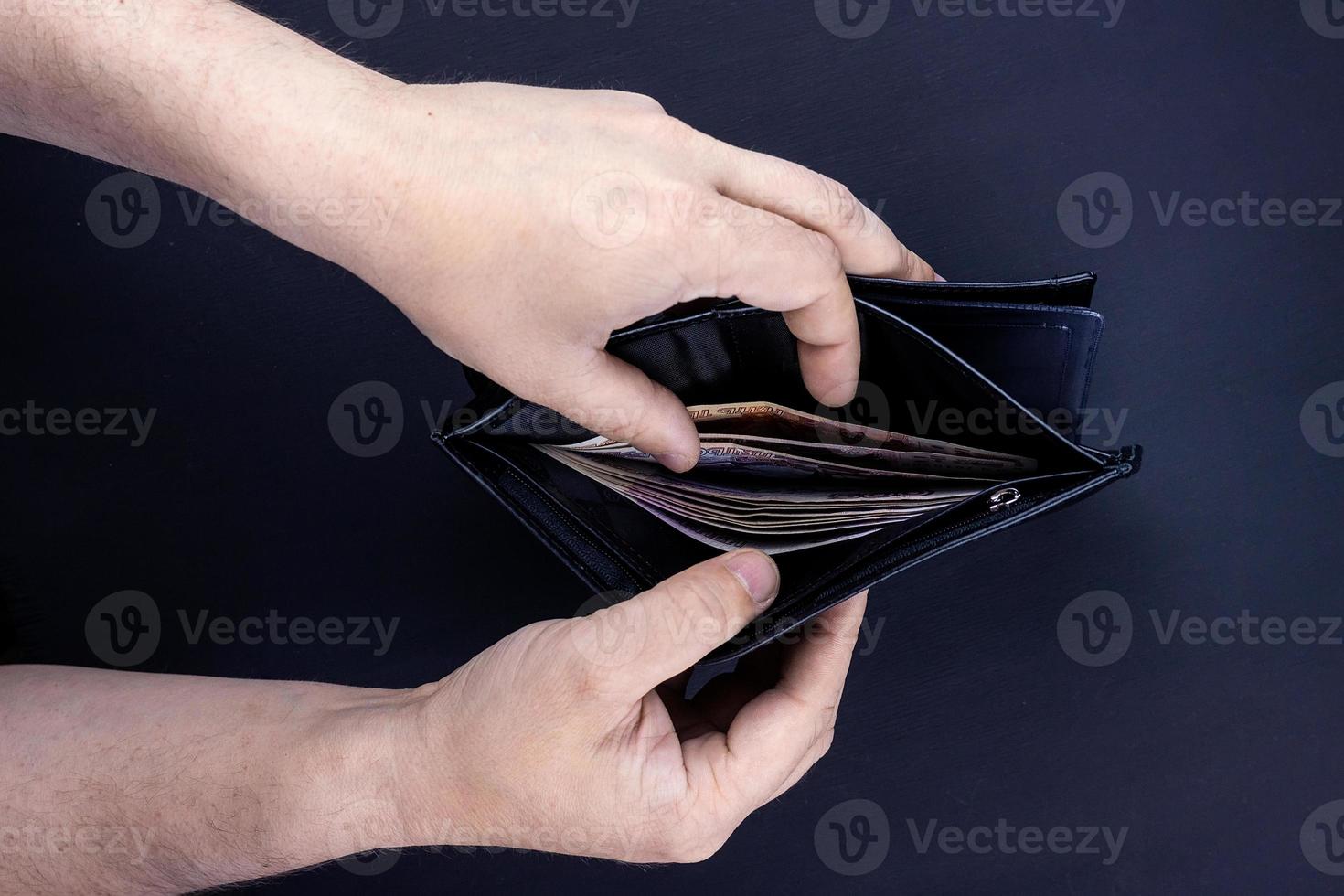 wallet with money in hand photo