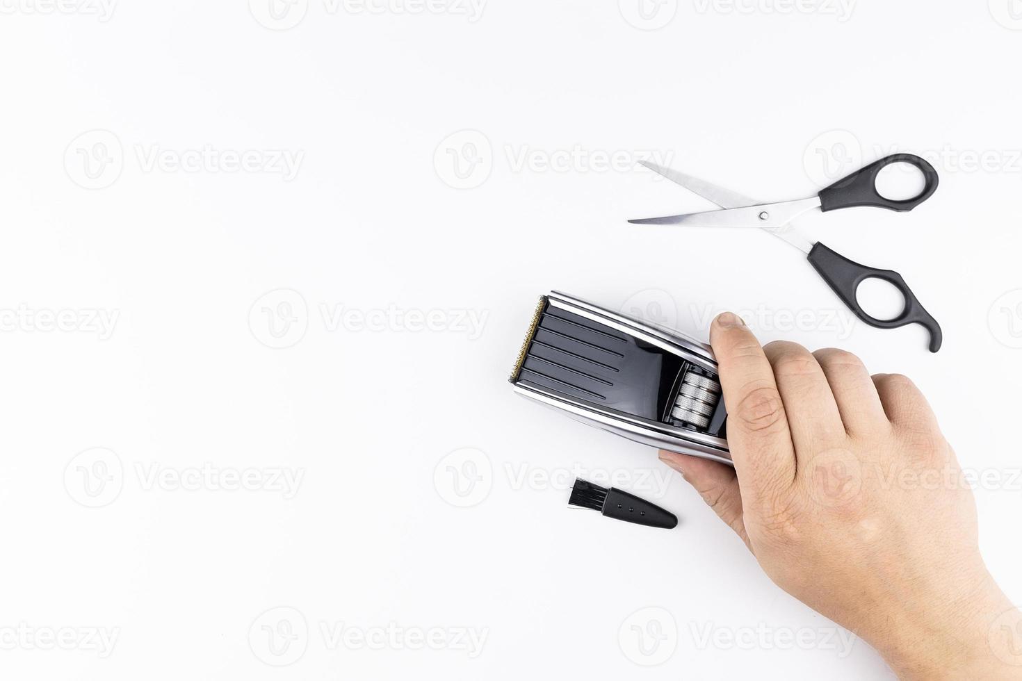 scissors and combs on white photo