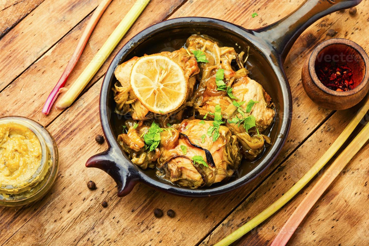 Appetizing chicken breast baked with rhubarb photo