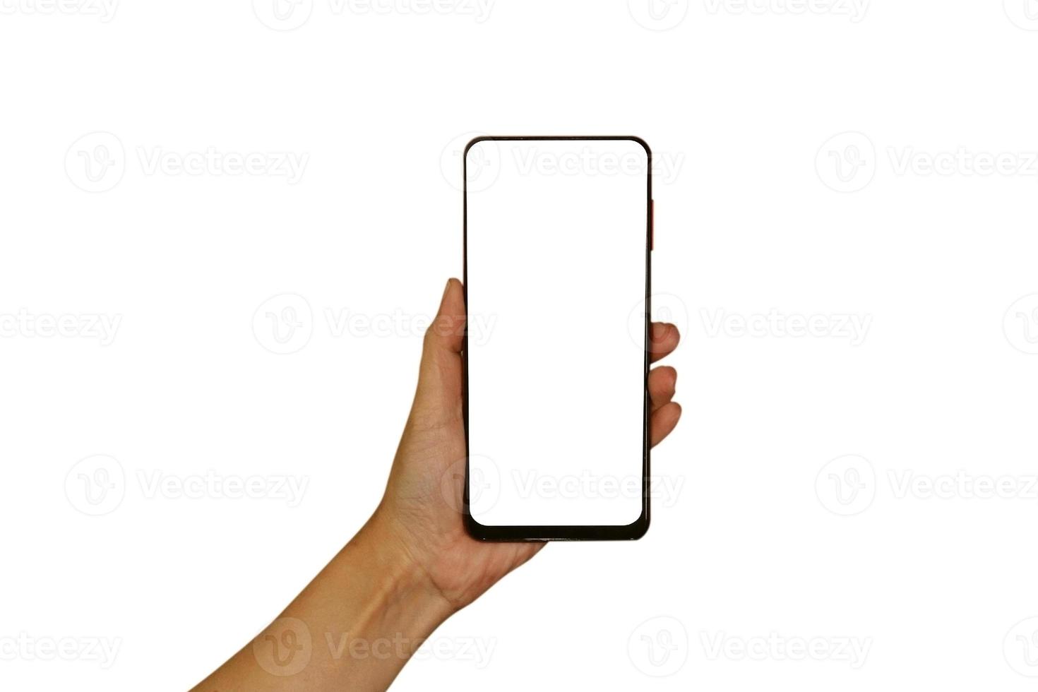 A woman's hand is holding a smartphone. Isolated object on a white background. Template for design. Mocap. photo