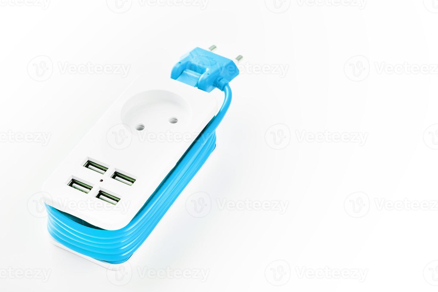 Extension Socket with USB Port on white background for charging phones and electronic devices, blue power cord. photo