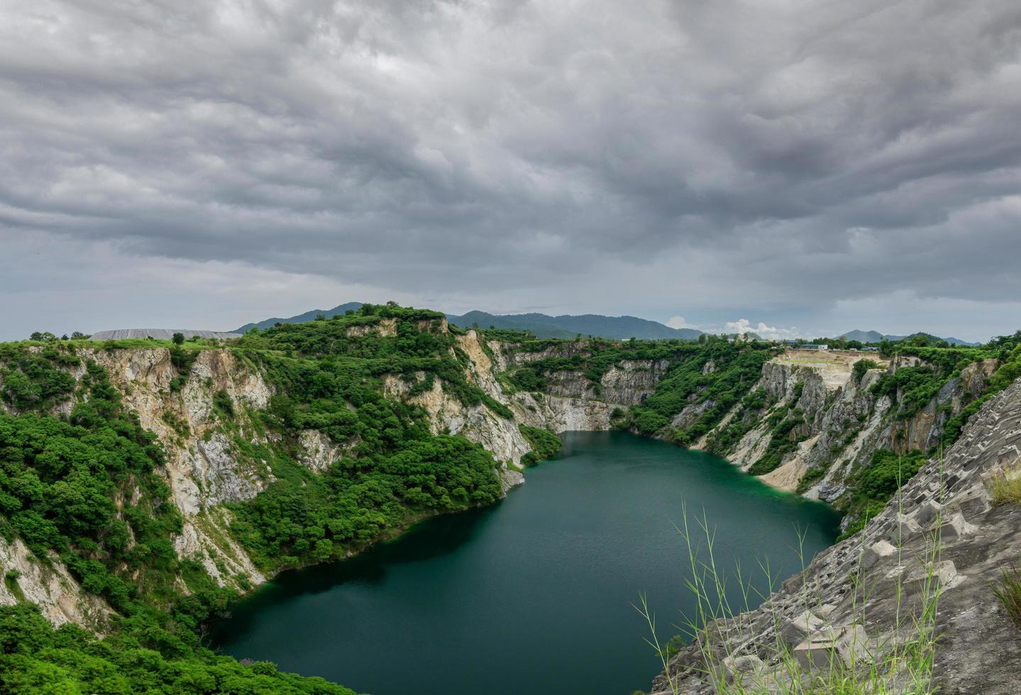 Grand Canyon, Chonburi Province, natural and photography attractions tourist landmark in Thailand Old mines and rain clouds  in background photo