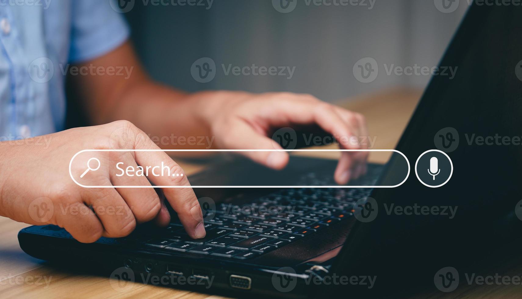 Search Engine Concept. Tools or programs for searching for information on the Internet. Men's hands use computers to find information using search engines and help grow online business. photo