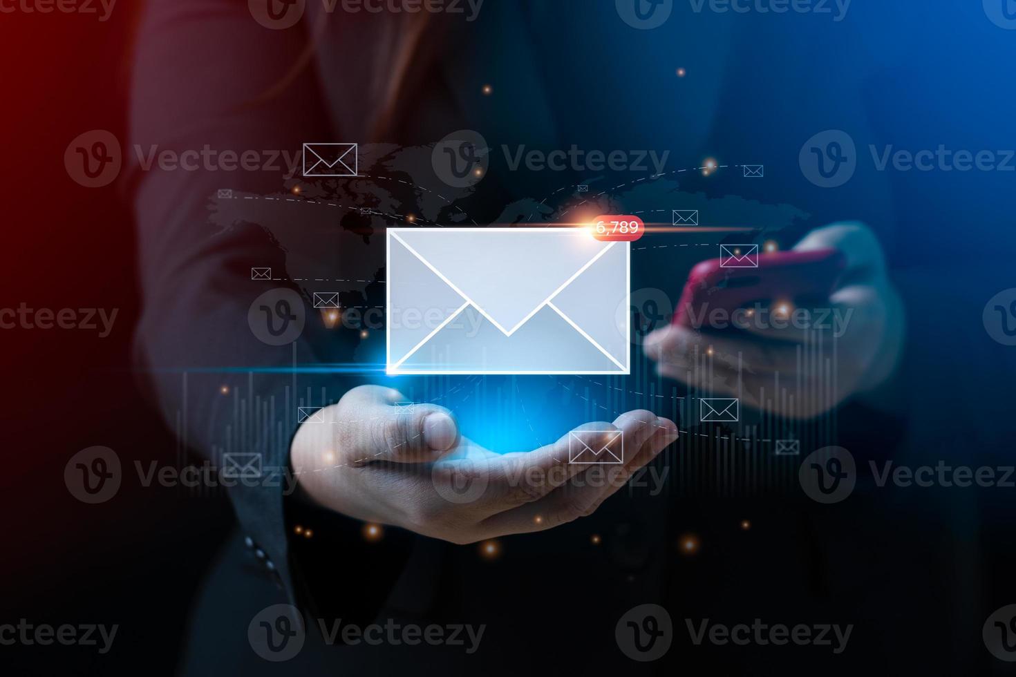 email marketing concept. businessman hand holding envelope or email icon global digital business network. electronic mail, e-commerce. newsletter email, Sending data, access to information photo