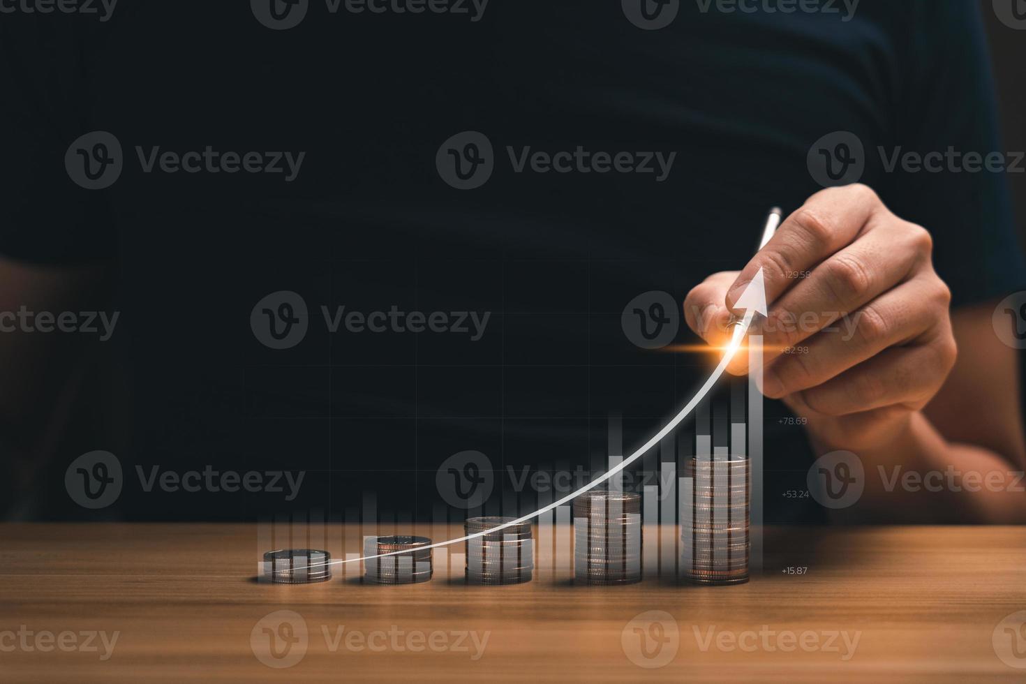 business people planning the growth of financial investments along with a graph showing the profit of the business. collecting money, financial planning, save money for the future photo