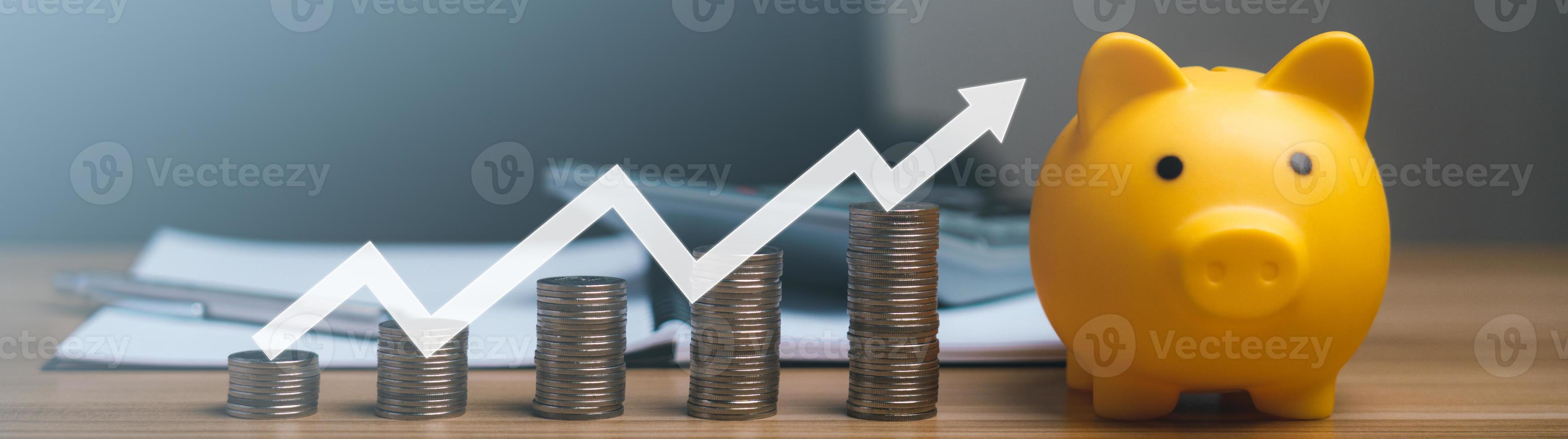 growing pile of coins and a piggy bank with arrows pointing towards success. concept of money growth and business finance photo