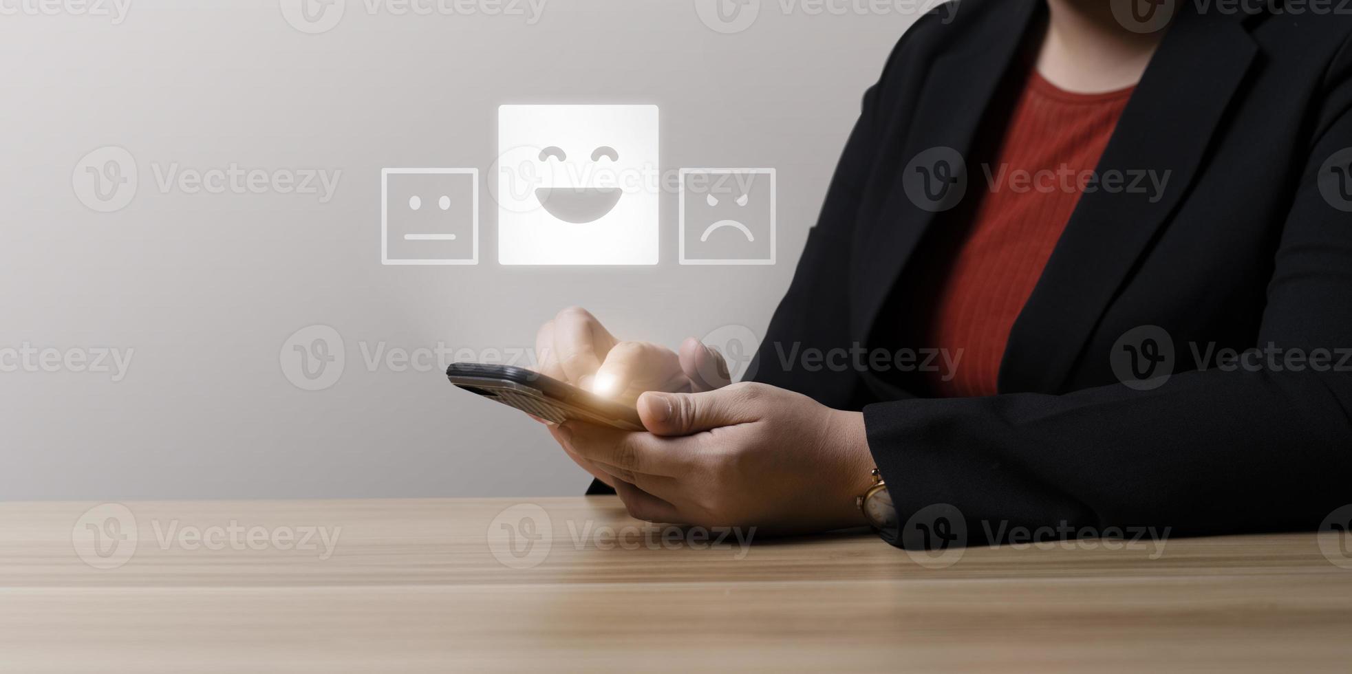 business woman rating with highest satisfaction icon Customer Satisfaction Survey Concept. service rating, business satisfaction survey. feedback review, Press smiley faces emoticons. photo