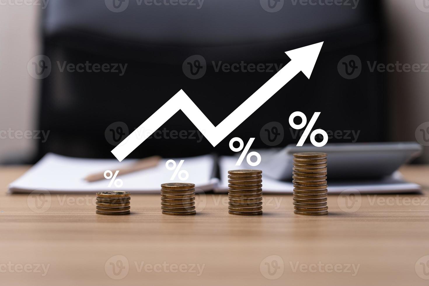 Interest rate and dividend concept. Businessman is calculating income and return on investment as a percentage. Show returns from mutual funds and stocks. long term investment for retirement photo