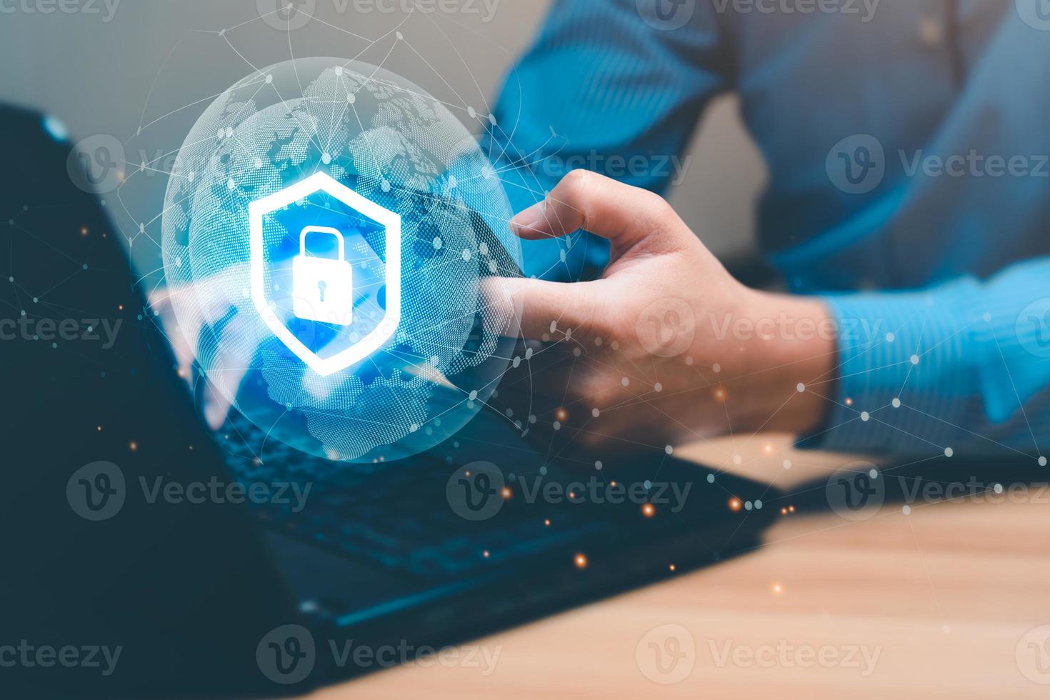 Technology concept with cyber security internet and networking, man holding smartphone with shield icon virtual with lock symbol with network security photo