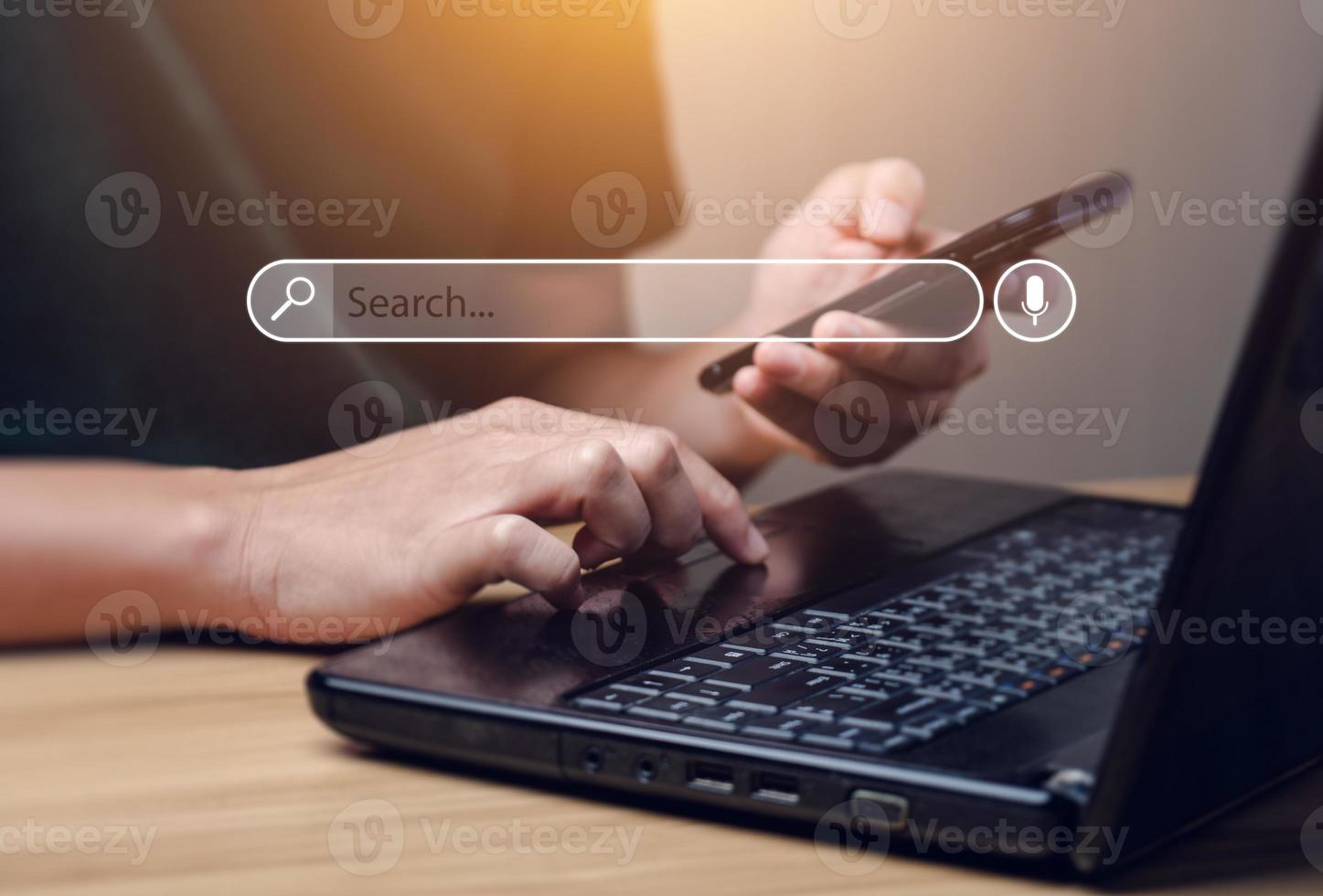 Search Engine Concept. Tools or programs for searching for information on the Internet. Men's hands use their laptops to find information using search engines and help grow your online business. photo