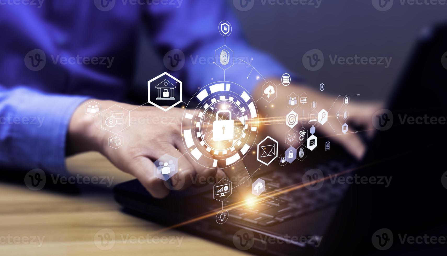 Data protection privacy concept and Internet Security and Cyber Network. Businessman working with laptop computer with padlock icon. data protection and personal information. Hackers' digital crimes photo