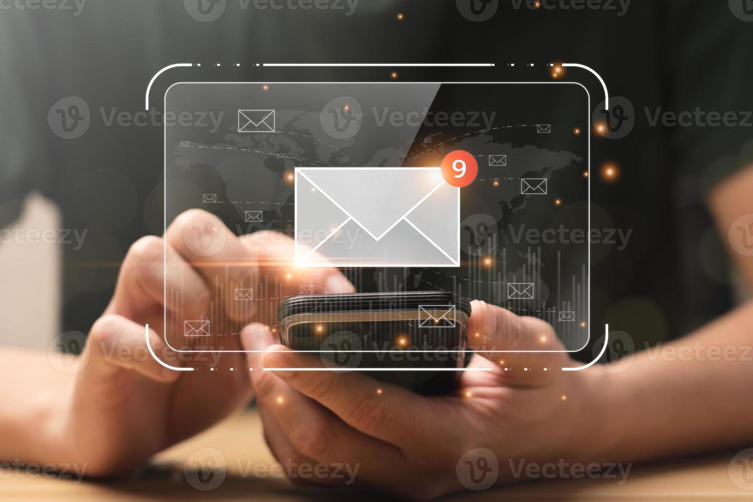 email marketing concept. Businessman checking email on mobile phone with email icon, electronic mail, e-commerce. newsletter email and protect your personal information from spam mail concept photo