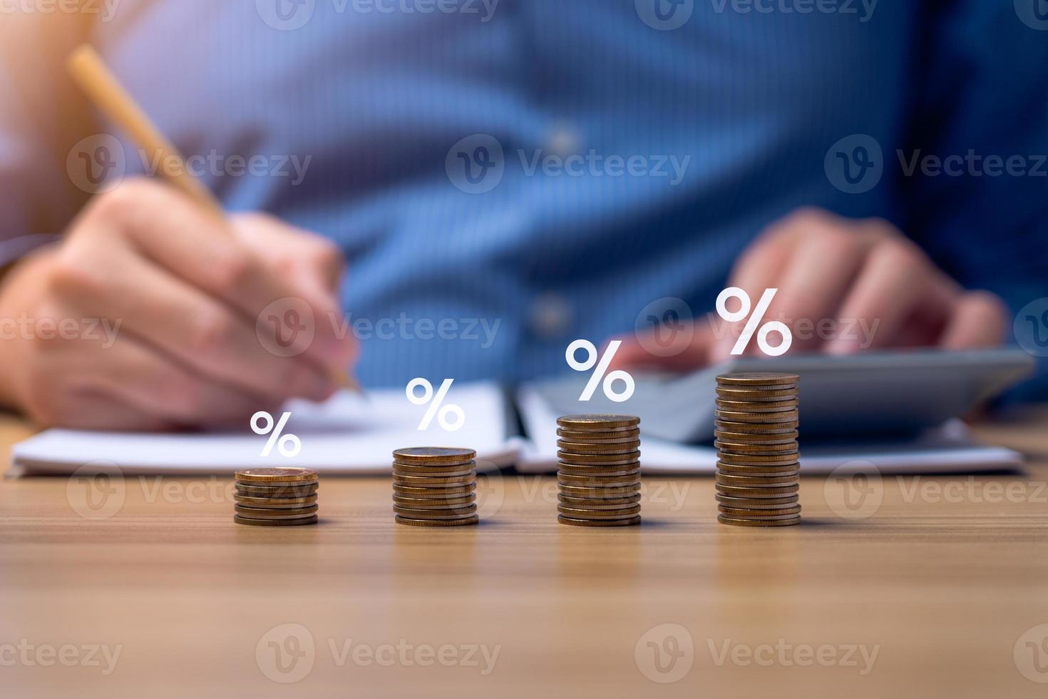 Interest rate and dividend concept Businessman is calculating income