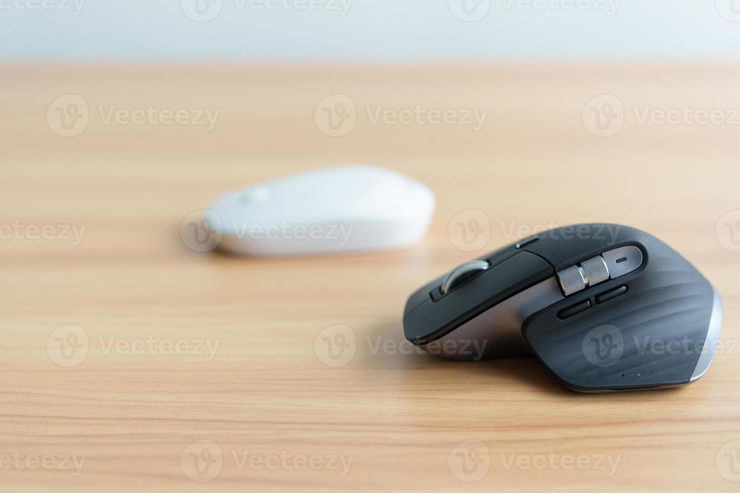 Comparison of Ergonomic vertical mouse and general mouse on desk at workplace, prevention wrist pain. De Quervain s tenosynovitis, Intersection Symptom, Carpal Tunnel or Office syndrome concept photo