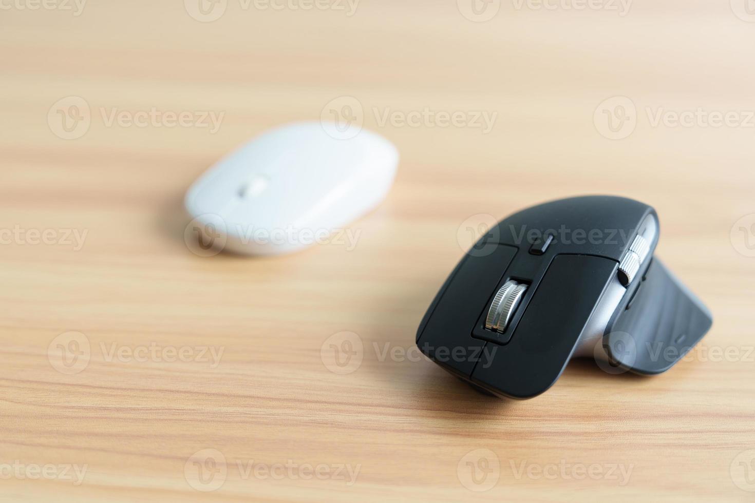 Comparison of Ergonomic vertical mouse and general mouse on desk at workplace, prevention wrist pain. De Quervain s tenosynovitis, Intersection Symptom, Carpal Tunnel or Office syndrome concept photo