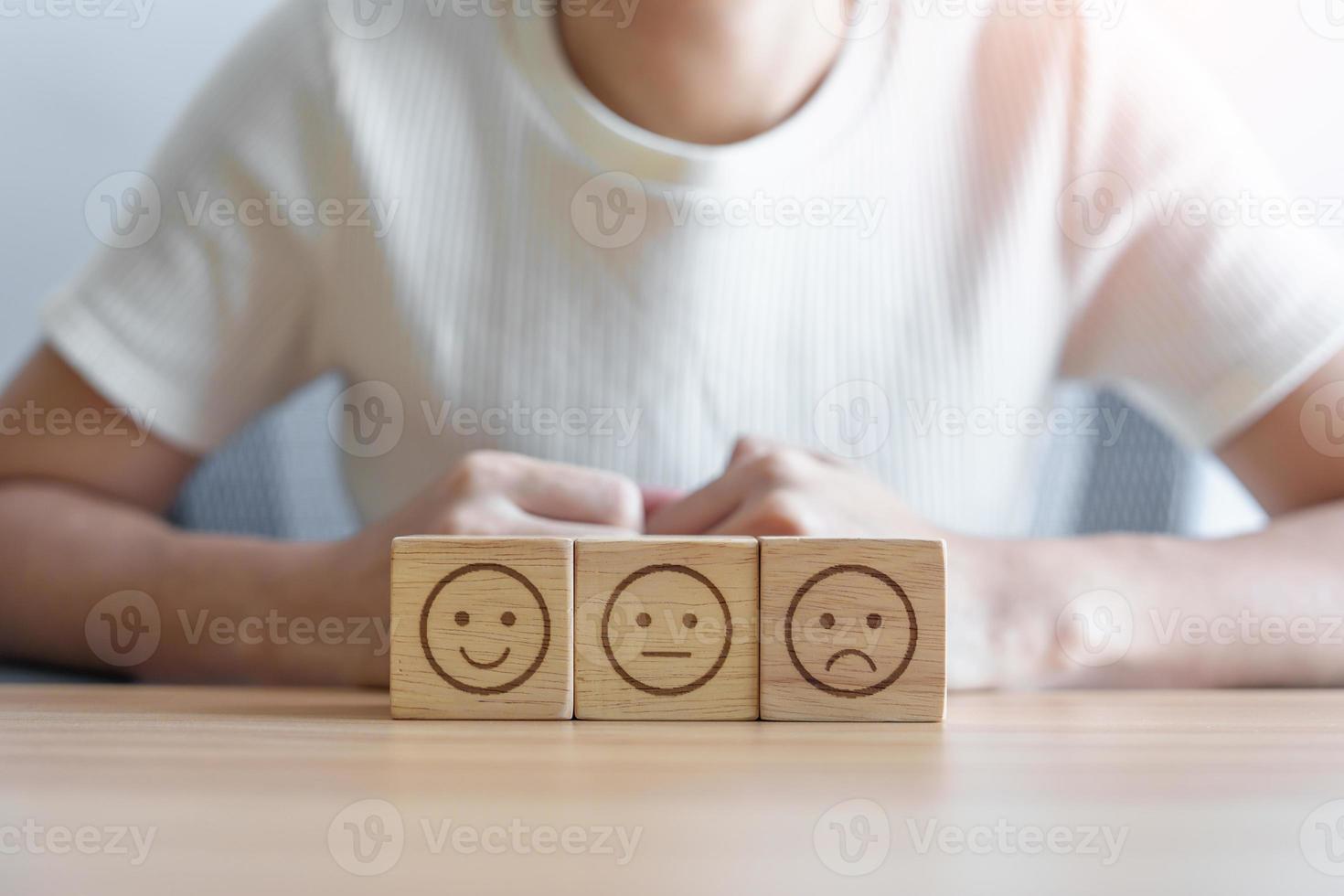 Emotion face block for customer review, experience, feedback, satisfaction, survey, evaluation, assessment, mood, world mental health day concept photo