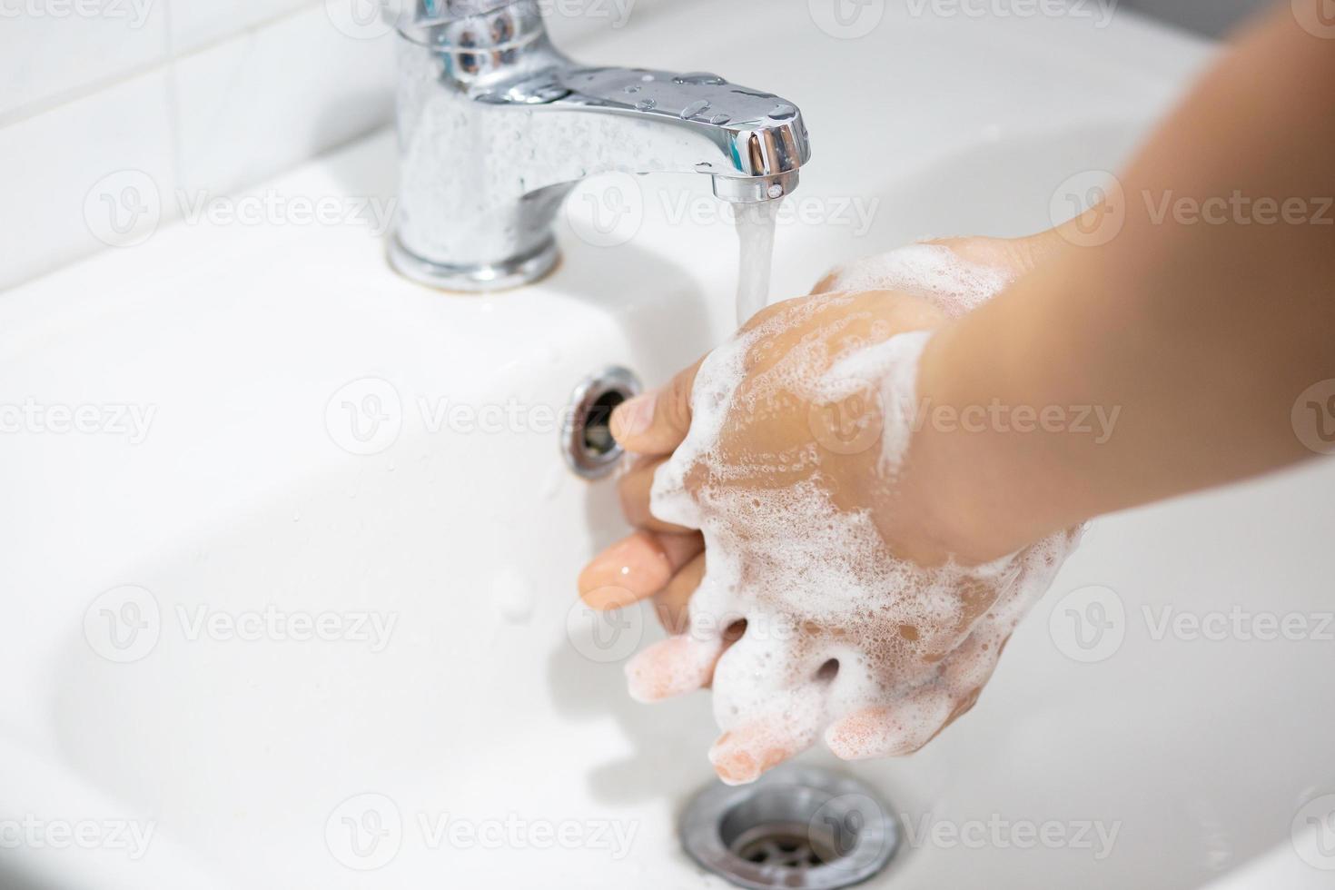 Always wash your hands after coming out of the bathroom to prevent viruses. photo
