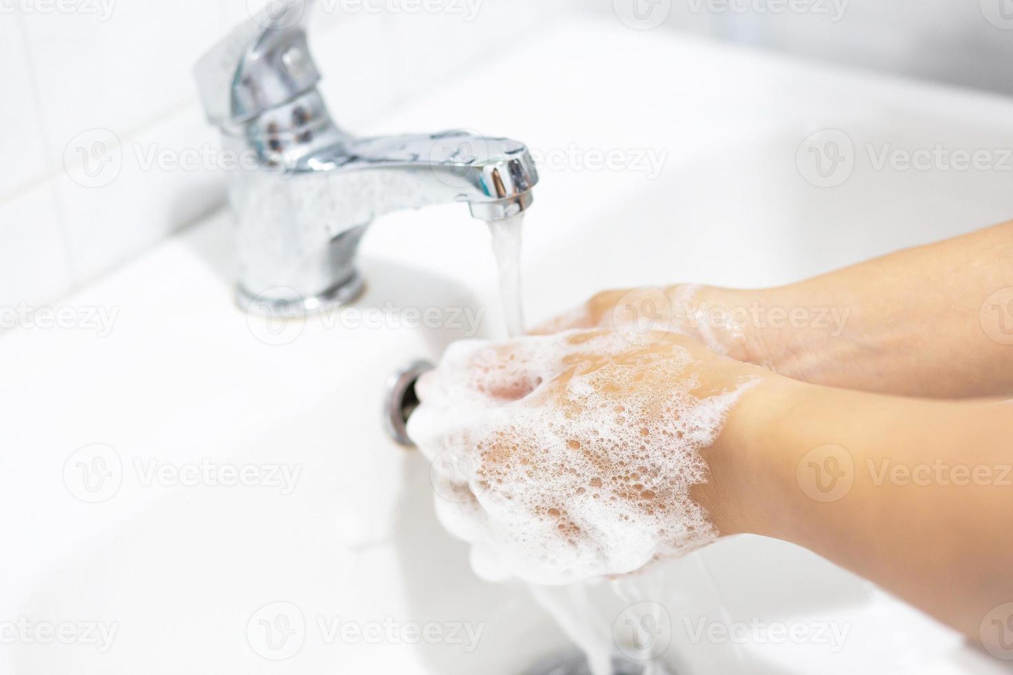 Always wash your hands after coming out of the bathroom to prevent viruses. photo