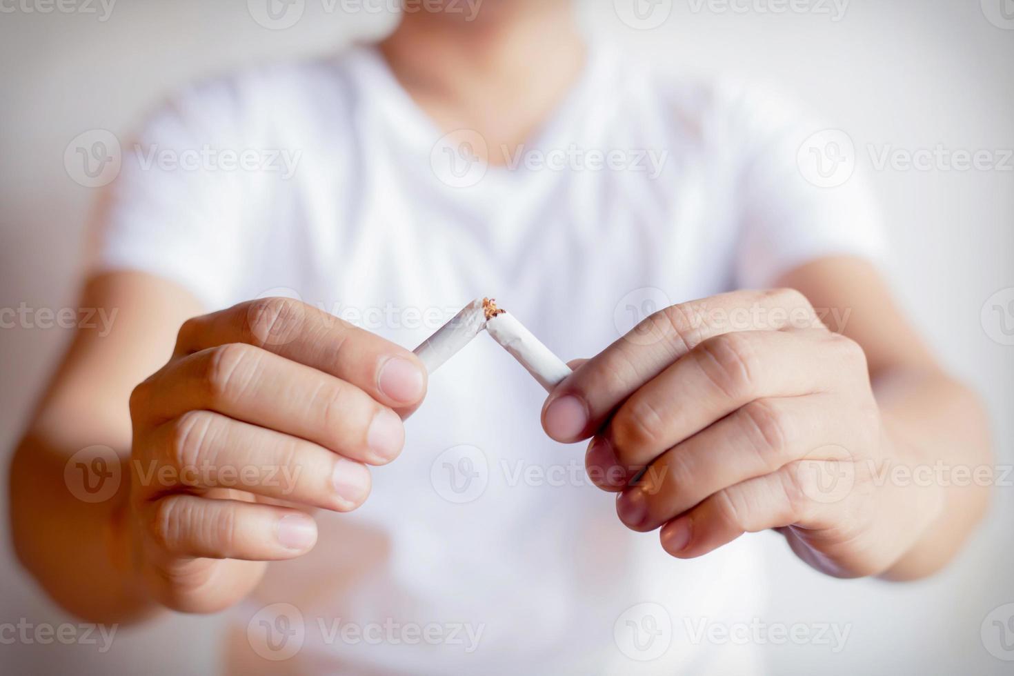 Men quit smoking for good health. photo
