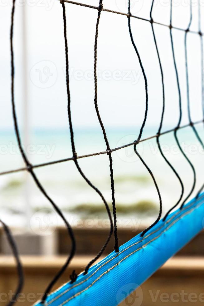 Beach volleyball net close up. Vertical image. photo