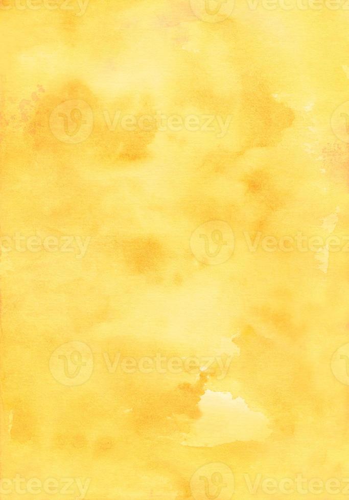 Bright yellow watercolor background. Watercolor abstract honey color backdrop. Stains on paper. photo