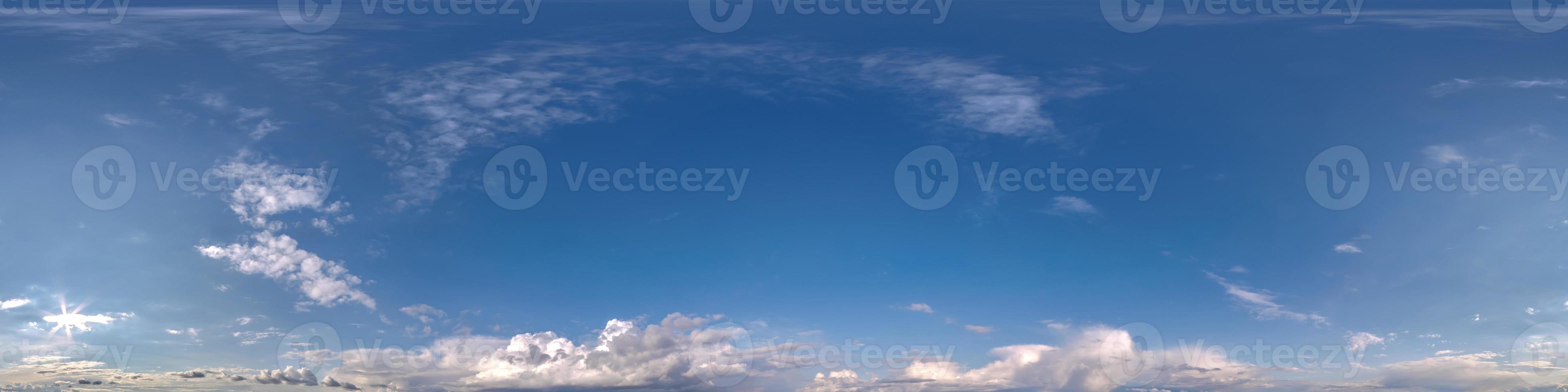evening dark blue sky hdr 360 panorama with white beautiful clouds in seamless projection with zenith for use in 3d graphics or game development as sky dome or edit drone shot for sky replacement photo