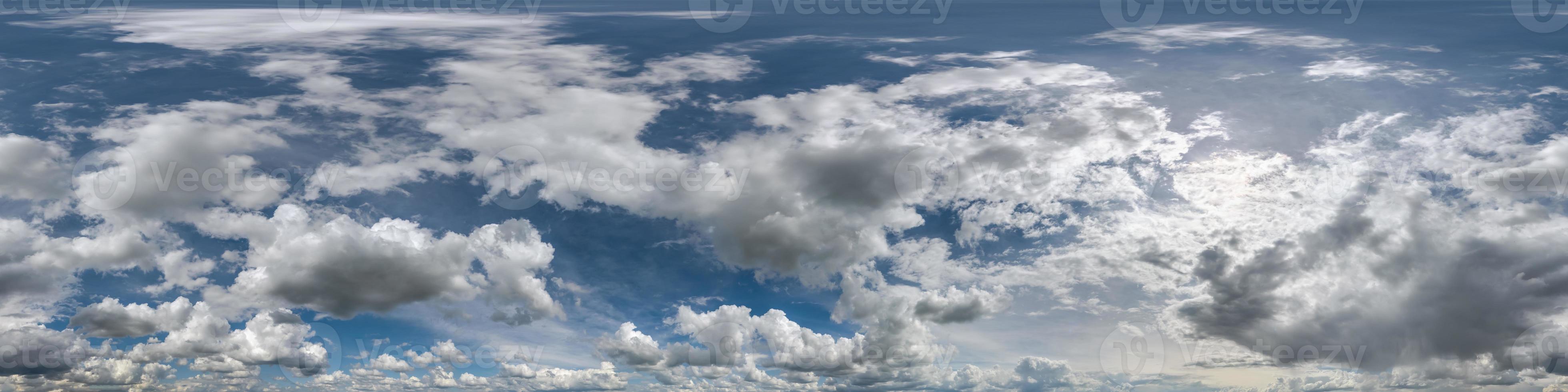 blue sky with beautiful clouds as seamless hdri 360 panorama view with zenith for use in 3d graphics or game development as sky dome or edit drone shot photo