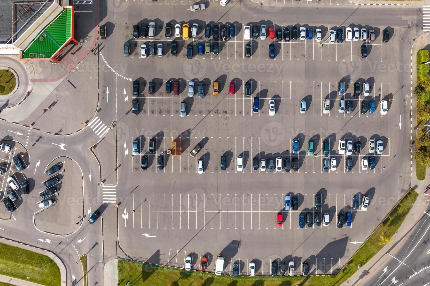 aerial view on large open air parking lot for cars for residents of area photo