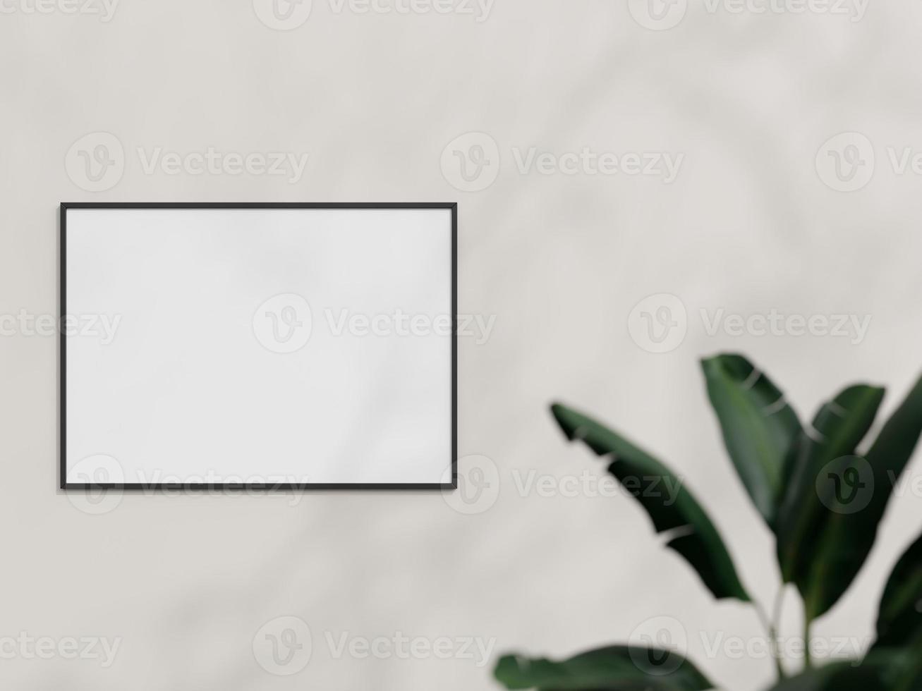 Clean and minimalist front view horizontal black photo or poster frame mockup hanging on the wall with plant. 3d rendering.