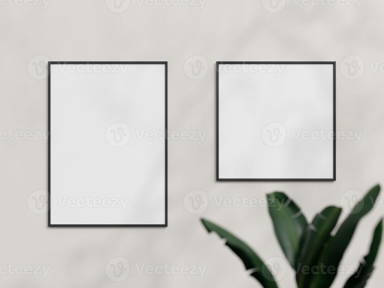 Clean and minimalist front view black photo or poster frame mockup hanging on the wall with plant. 3d rendering.
