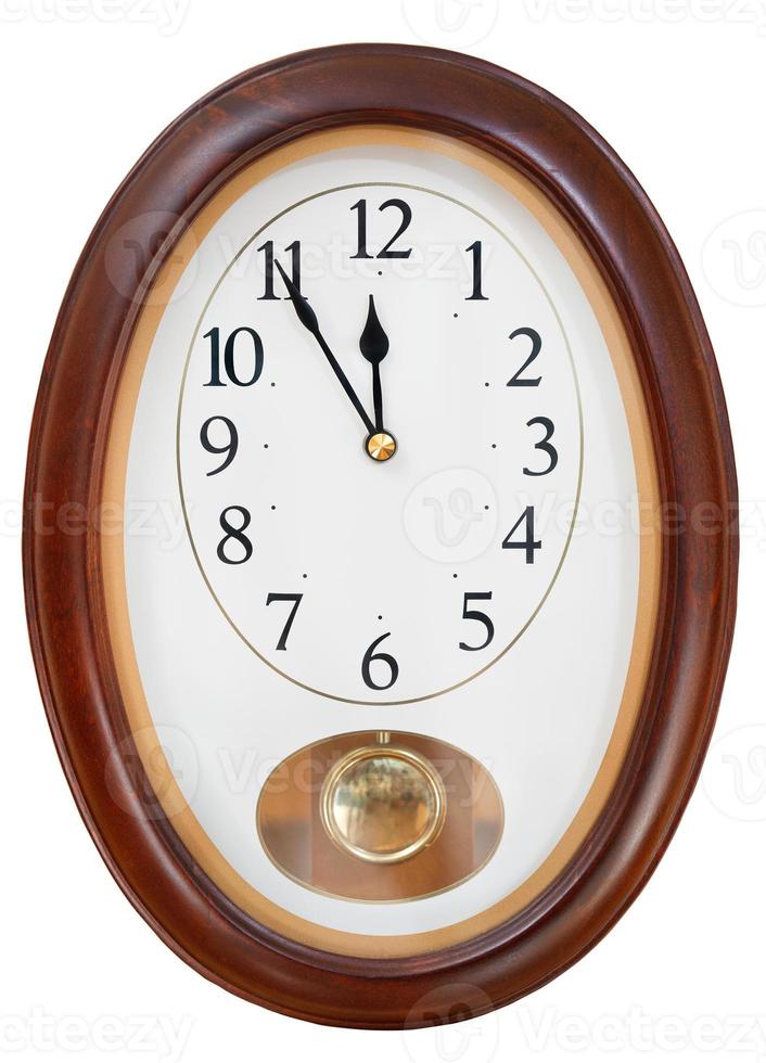 at five minutes to twelve on wall clock photo