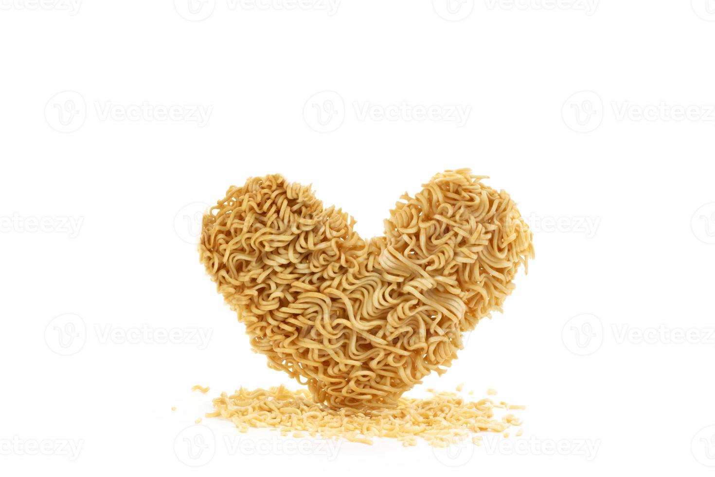 instant noodles heart-shaped isolated on white background raw noodles or fast cooked food pasta or fast food Asian Japanese Chinese photo