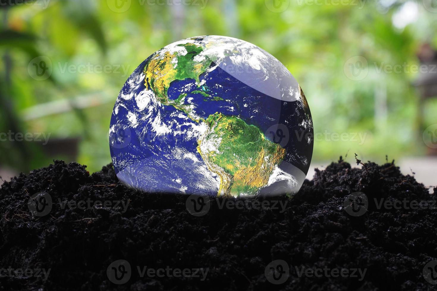 The concept of loving the earth and the environment. globe on earth photo