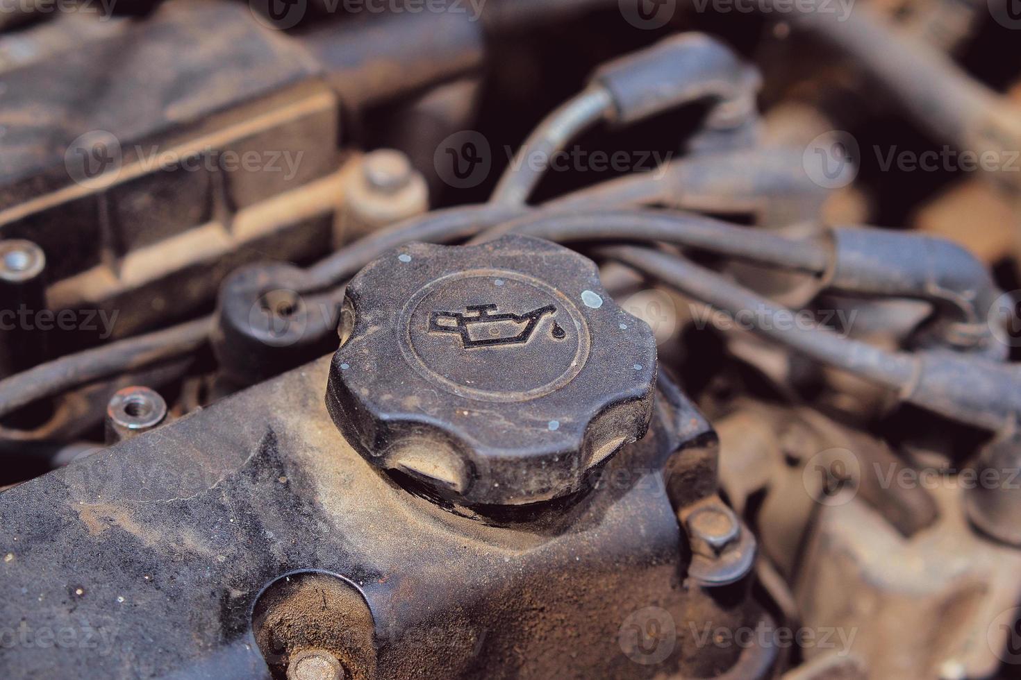 Dirty engine oil stains that have not been maintained. The concept of engine dirt can cause engine failure. photo